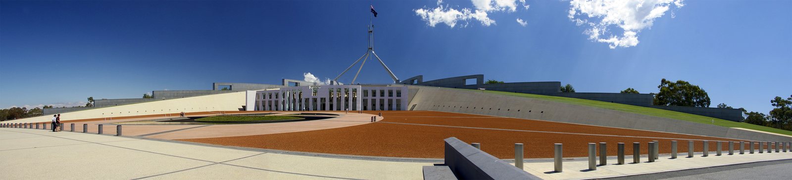 Panoramic exterior of Parliament House and its flag mast in Canberra