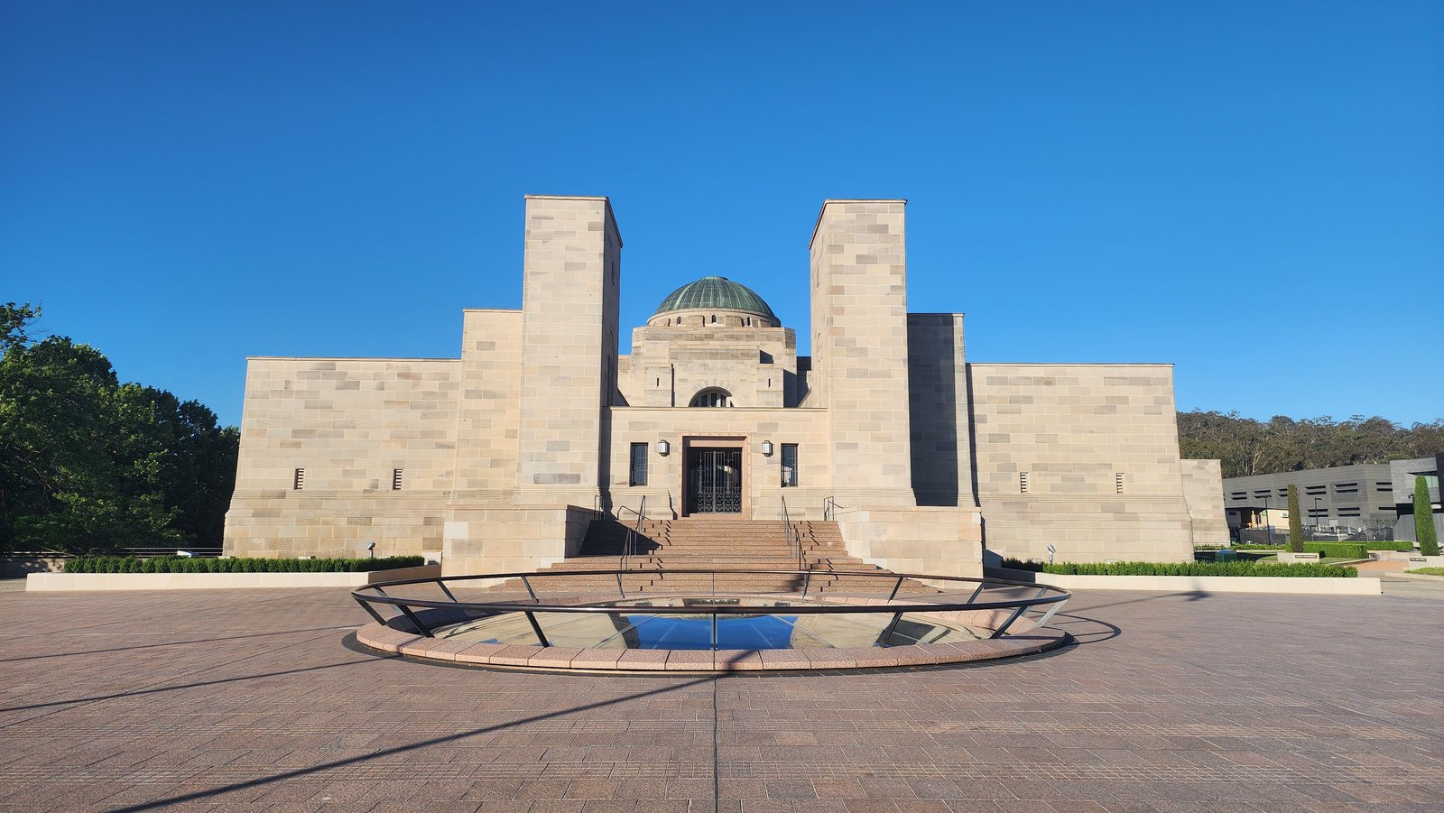 Australian War Memorial front facade with the oculus in the forecourt